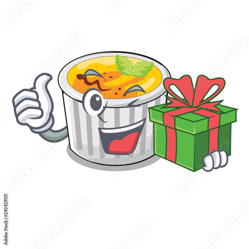 With gift creme brulee on wooden character table
