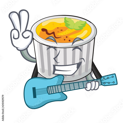With guitar creme brulee on wooden character table