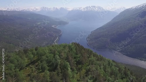 Flying over forrest in Norway. photo