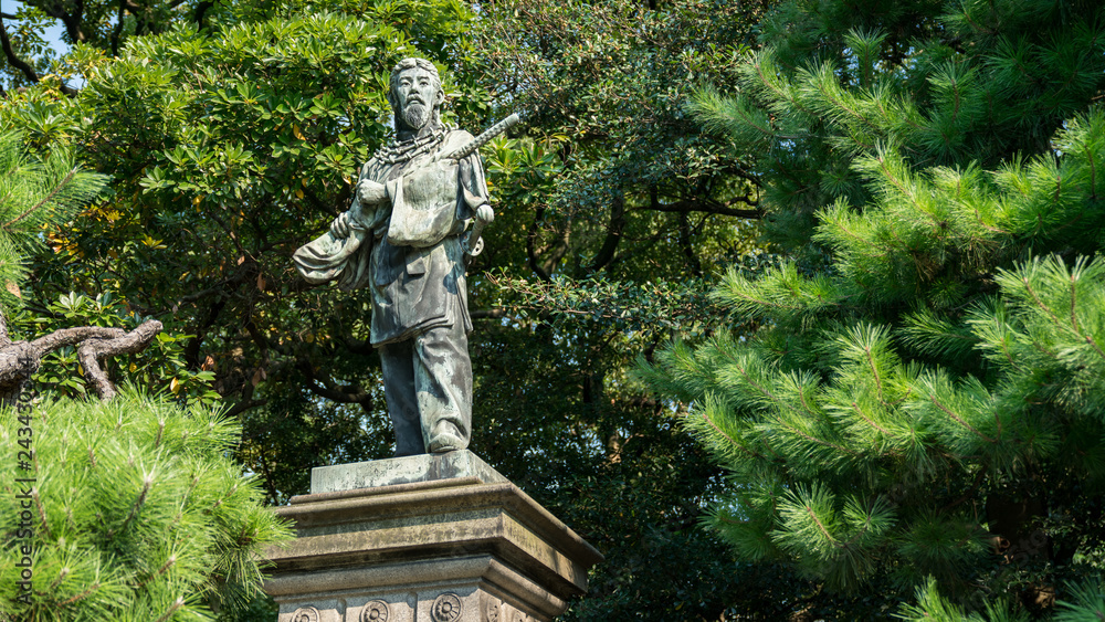 Umashimadenomikoto statue in Hamarikyu Gardens, in Tokyo, Chuo district, Sumida River, Japan Umashimadenomikoto statue in Hamarikyu Gardens, in Tokyo, Chuo district, Sumida River, Japan