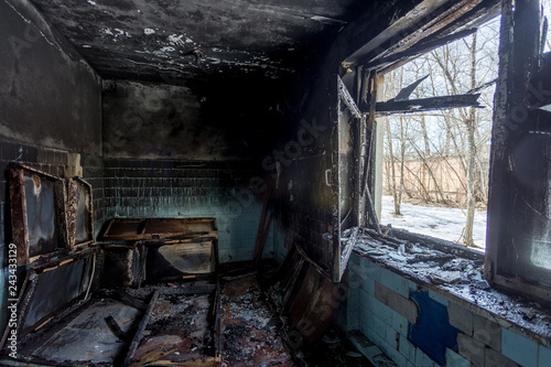Burned interiors after fire of industrial or residential building. Fire consequences concept