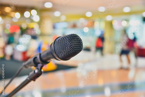Microphone on abstract blurred of The space in the meeting and stage performances