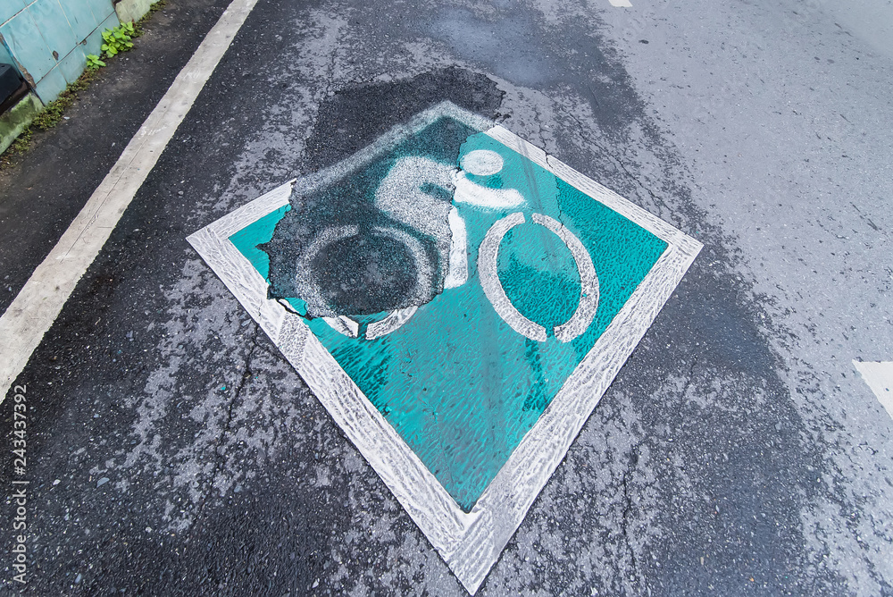 Φωτογραφία The symbol of the bike's path is on the road.Thailand.