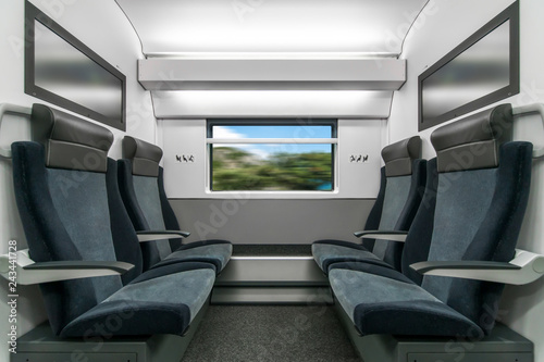 Emtpy interior of the fas train for long and short distance with tv on the wall © Media_Works