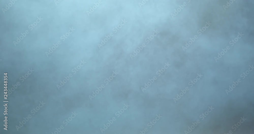 Blue dense smoke covering the screen. Slow rising smoke on a gray background. Shot in ProRes Raw, rec. 2020 HDR 4k 120fps Blue dense smoke covering the screen. Slow rising smoke on a gray background. Shot in ProRes Raw, rec. 2020 HDR 4k 120fps