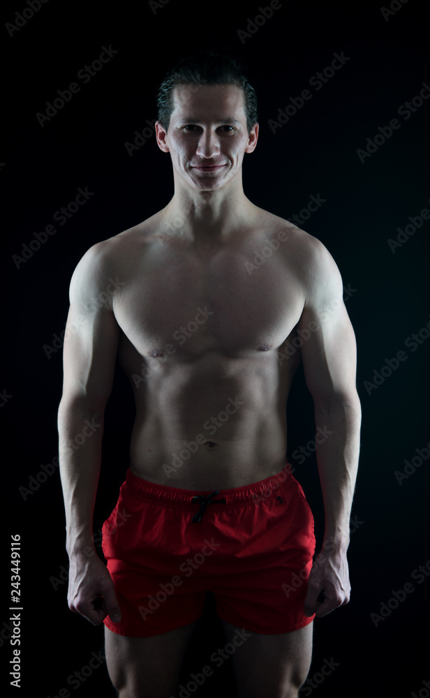 Naklejka premium Healthy and strong. Improve yourself. Macho handsome with muscular torso. Attractive guy muscular chest. Muscular bodybuilder concept. Proud of excellent shape. Man muscular athlete stand confidently