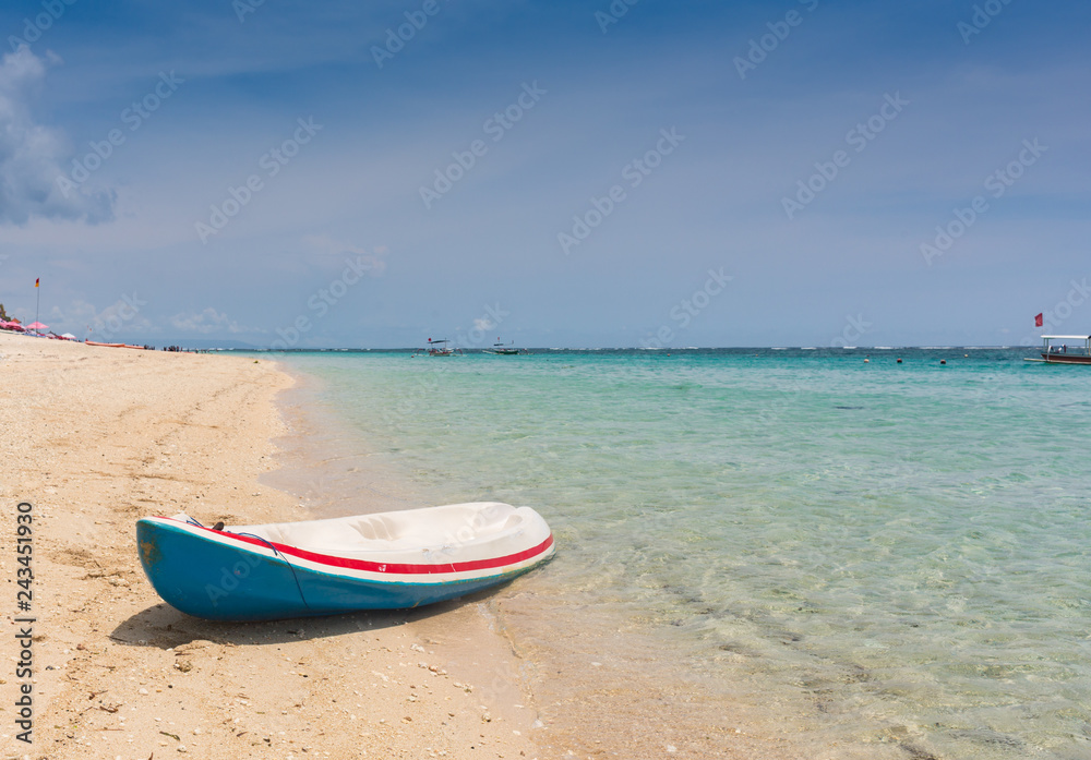 Kayak at the tropical beach at beautiful sunset.