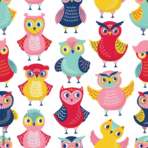 Seamless pattern with cute funny owls or owlets on white background. Childish...