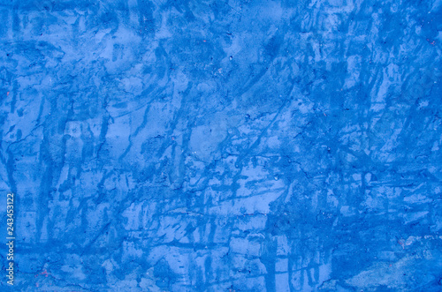 embossed blue shabby wall. grunge background