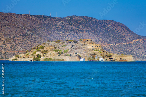 Fortress on the island of Spinalonga. A historic city on the island of lepers. Defensive walls and buildings in Spinalonga Fortess. Holidays in Crete, Greece.