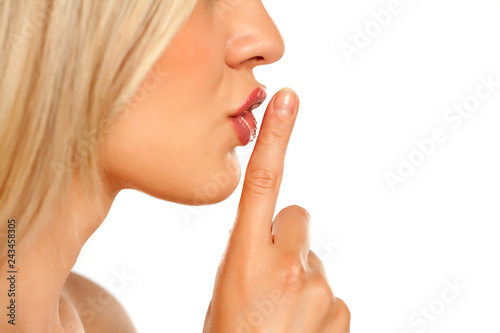 finger over the lips. silence concept