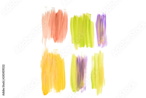 Abstract watercolor coral, golden, purple and green brushstrokes isolated on white