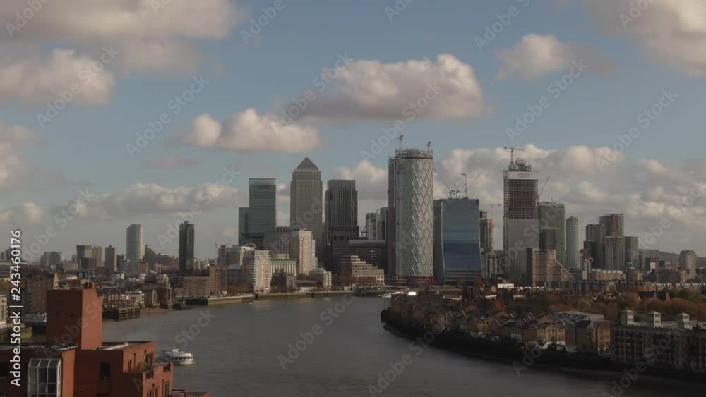 Aerial ascending view of the financial district of the Docklands in London Aerial ascending view of the financial district of the Docklands in London