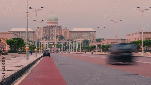 Evening Timelapse of Malaysia Prime Minister Office in Putrajaya City. Cars moving in and out of the frame long exposure photo