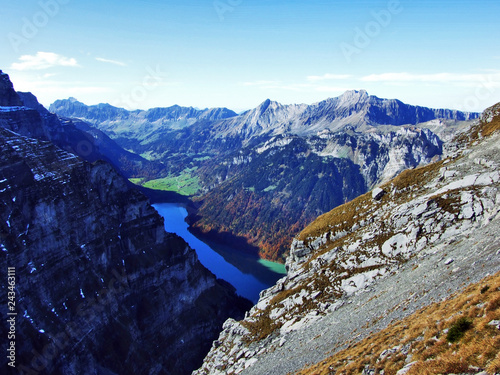 Peak Dejenstock or Dejenstogg and the mountain chain north of Lake Klontalersee - Canton of Glarus, Switzerland photo