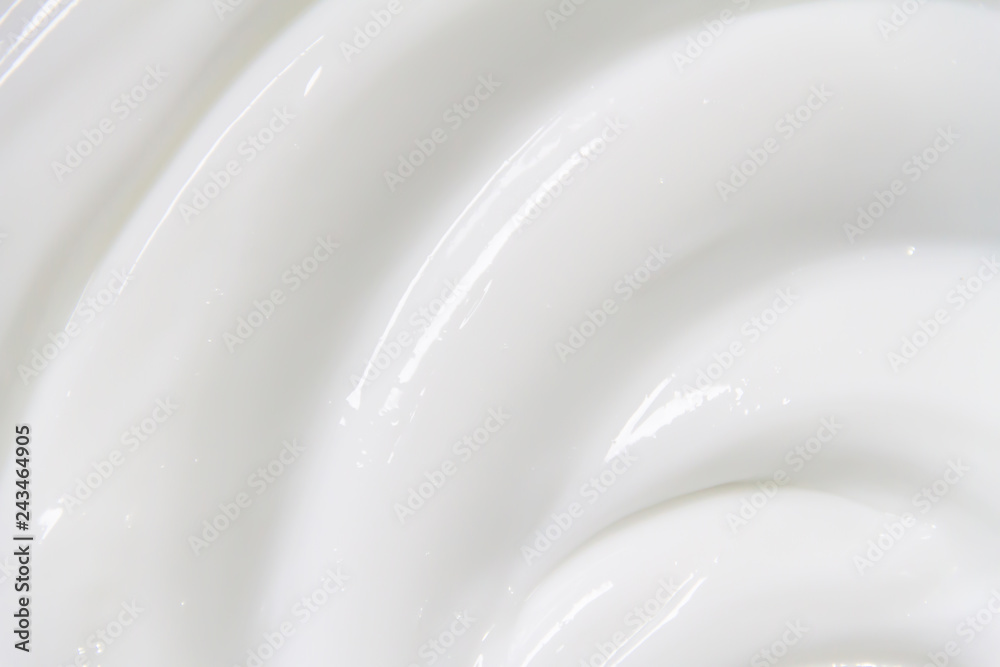 The white surface of the cream lotion softens the background. The white surface of the cream lotion softens the background.