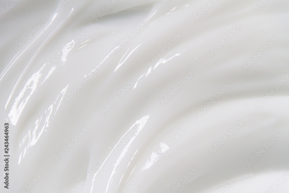 The white surface of the cream lotion softens the background. The white surface of the cream lotion softens the background.