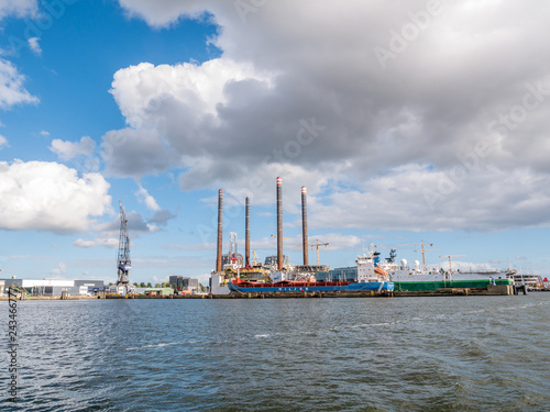 Photography Ships docked in shipyard near NDSM wharf on northern bank of IJ river in Amsterd