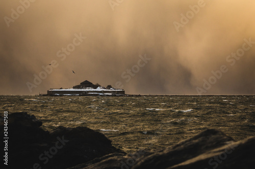 View on Munkholmen island during storm and blizzard.