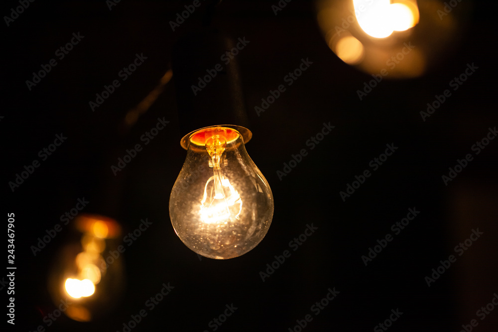 a garland of incandescent bulbs with warm light a garland of incandescent bulbs with warm light