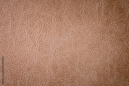 Textured background surface of leather upholstery furniture close-up. burlap brown color fabric structure