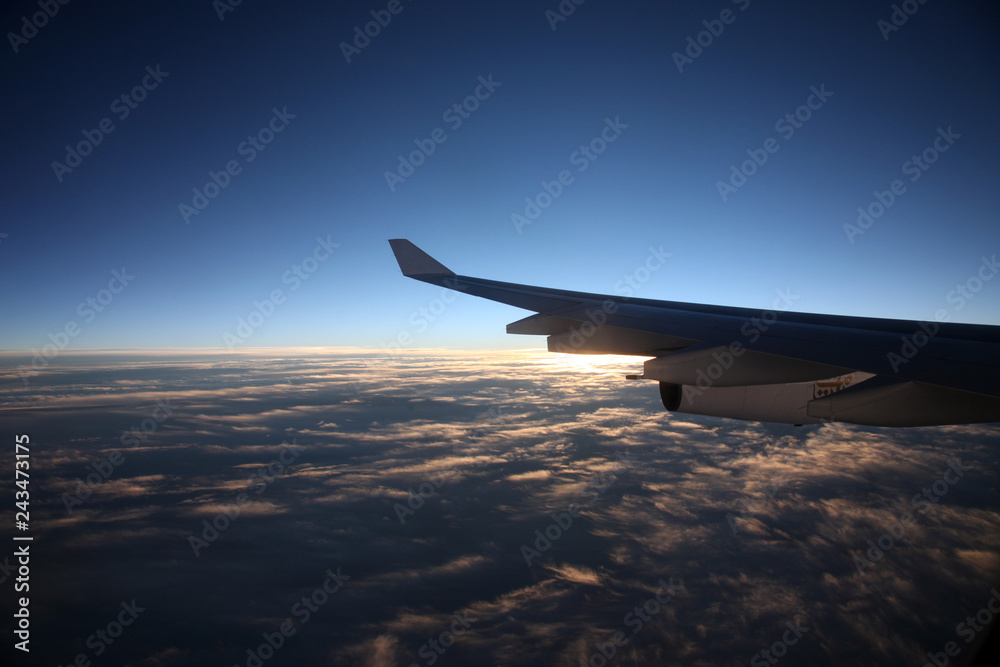 Fototapeta premium Wing of airplane from window