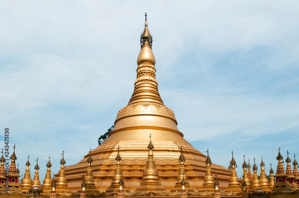 Fototapeta premium Simulate of Shwedagon Pagoda at Suwankiri Temple, Ranong, Thailand