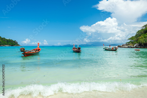 traditional thai boats in a bay of the Koh Racha Yai island in Thailand at the Phuket © wundermann