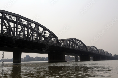 Bridge across the river, Vivekananda Setu. It links the city of Howrah, at Bally, to its twin city of Kolkata, at Dakshineswar.