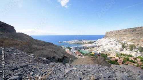 An elevated view over Puerto de Mogan on the south west of Gran Canaria.  The former fishing village is now a popular tourist resort.