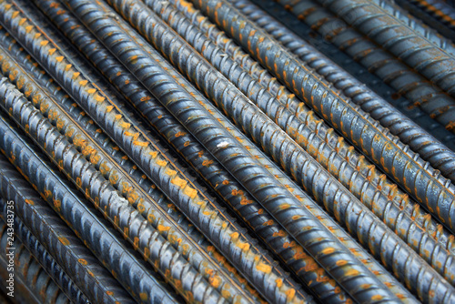 The bars of the rusty steel fittings.
