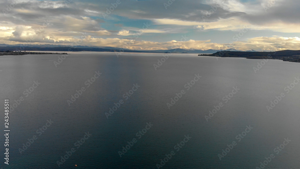 Fototapeta premium Beautiful lake at sunset, aerial view