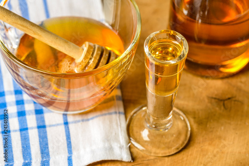 Obraz na płótnie homemade mead (honey wine) on an old table close up