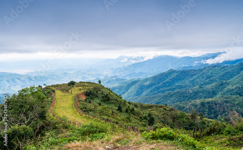 Mountain with sky scenery between the way