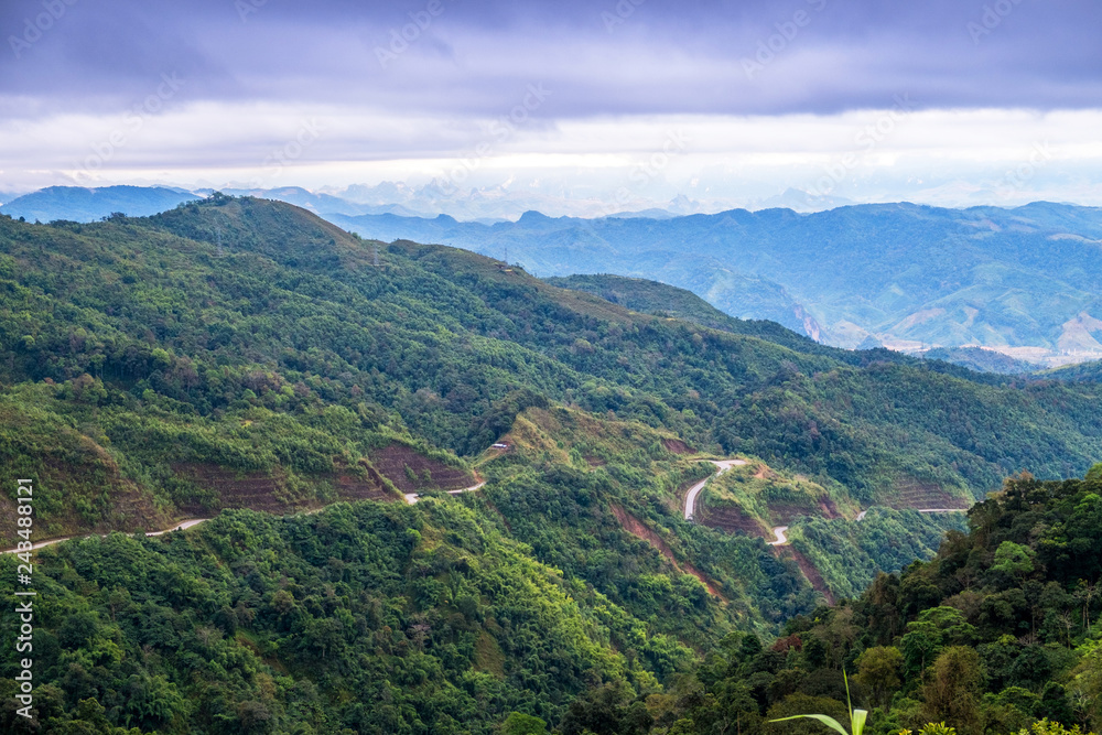 Fototapeta premium Mountain with sky scenery between the way