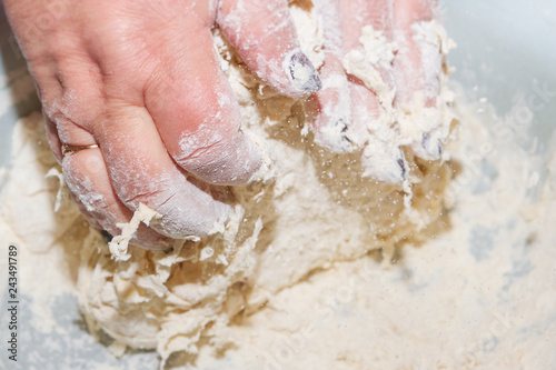 Mix the dough with your hands in a bowl