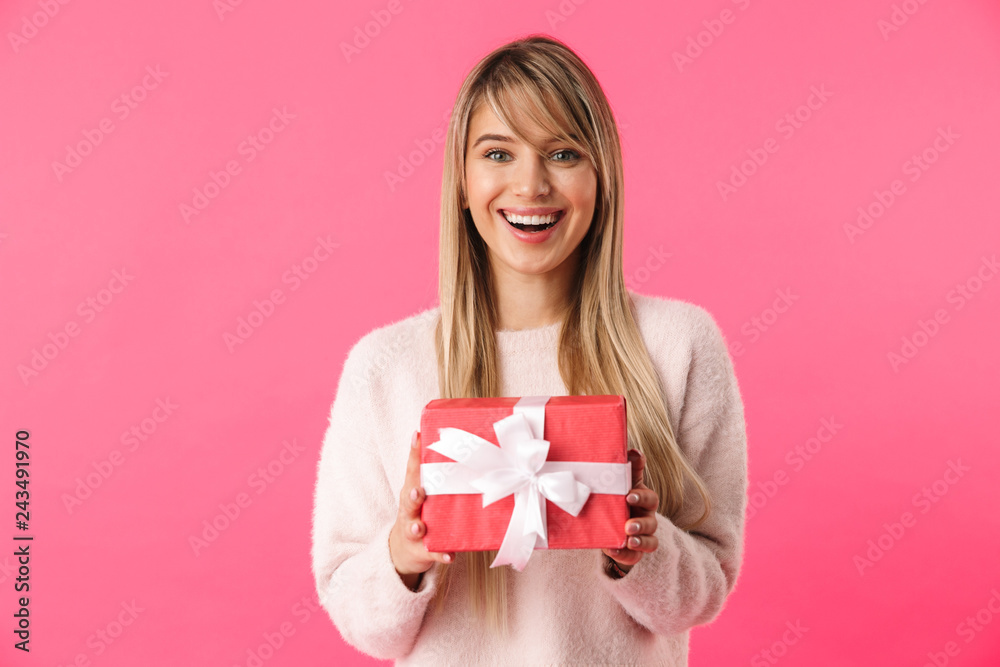 Cheerful young blonde girl standing isolated Cheerful young blonde girl standing isolated
