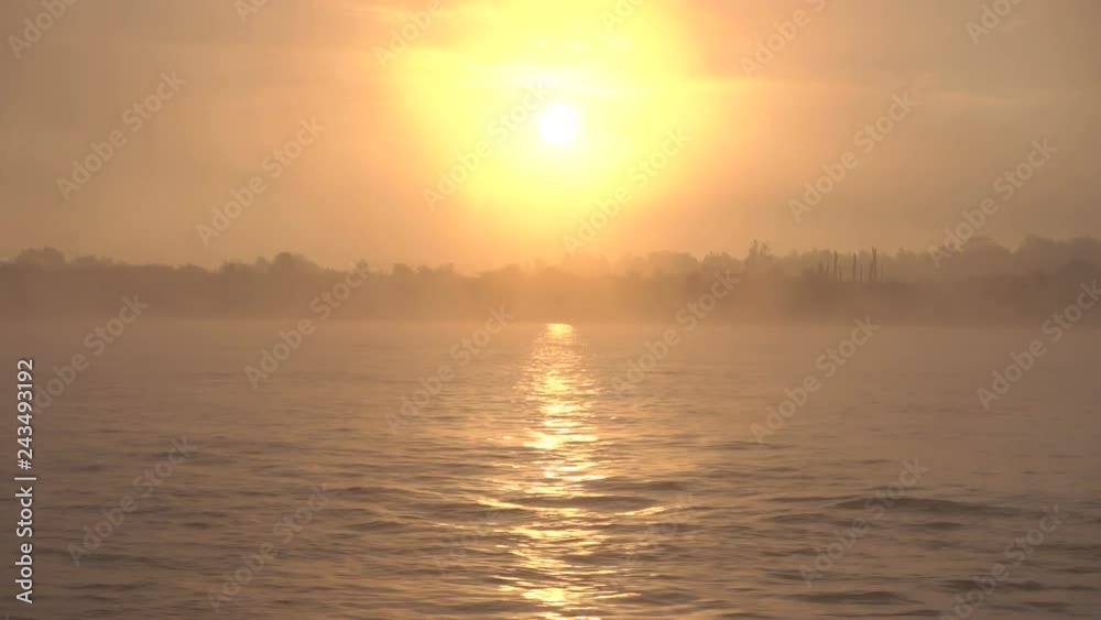 Sunrise on misty morning, Netherlands Sunrise on misty morning, Netherlands
