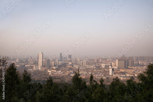 view of Jinan city from thousand Buddha mountain in autumn evening, China