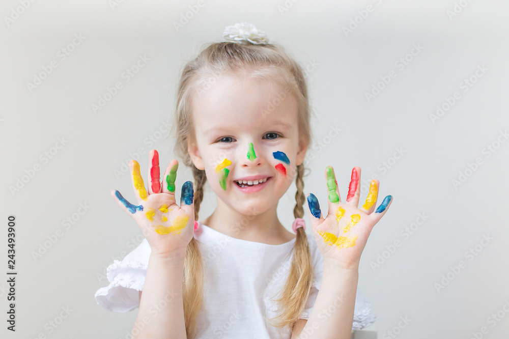 Caucasian Little Girl Painting with Colorful Hands Paints at Home Early Education Preparing for School Preschool Development Children Game Caucasian Little Girl Painting with Colorful Hands Paints at Home Early Education Preparing for School Preschool Development Children Game
