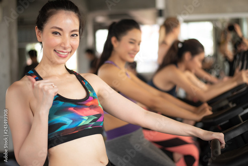 Group of young woman exercise on treadmill in the gym