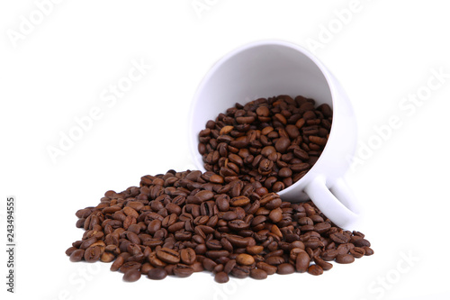 Coffee beans in cup isolated on white background.