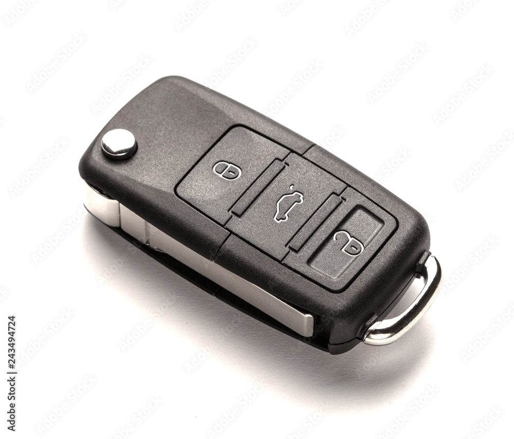 Car keys with remote control alarm system isolated on white background. Car keys with remote control alarm system isolated on white background.