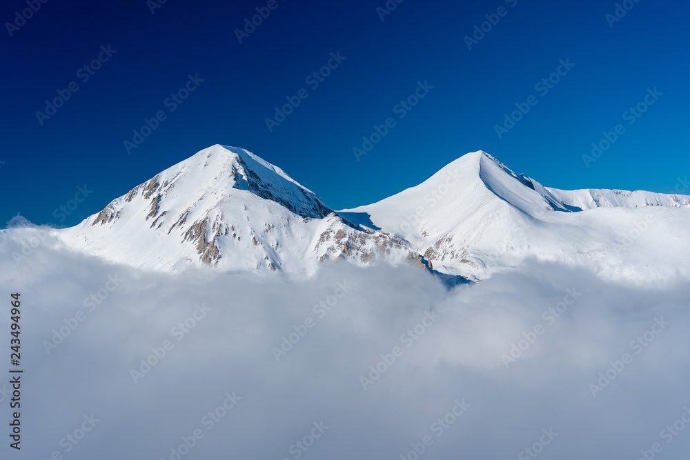 snow mountain peak and clouds clear sky pirin bulgaria