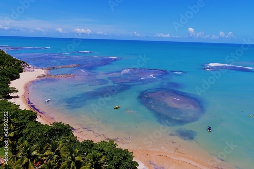 Aerial view of a paradise beach with crystal water. Fantastic landscape. Great beach view. Trancoso, Bahia, Brazil