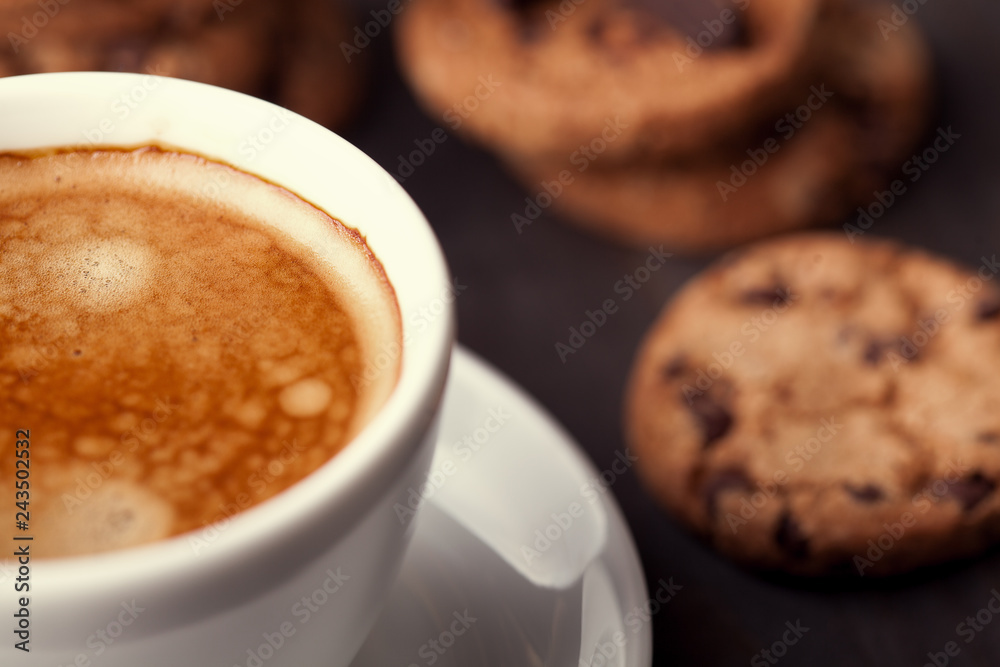 Coffee cup with chocolate cookies on dark old wooden table. Breackfast Coffee cup with chocolate cookies on dark old wooden table. Breackfast