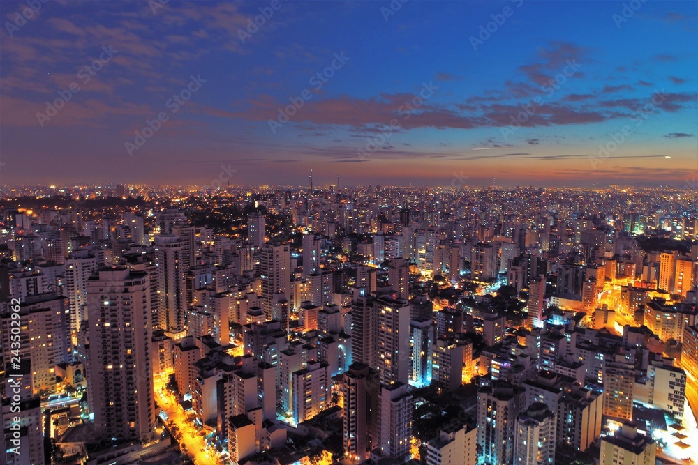 Aerial view of sunset on the city. Fantastic landscape. Great contrast and lightning. São Paulo, Brazil