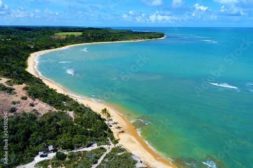 Aerial view of a paradise beach with crystal water. Fantastic landscape. Great beach view. Trancoso, Bahia, Brazil photo