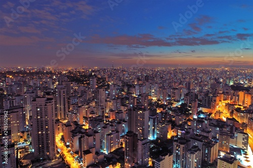 Aerial view of sunset on the city. Fantastic landscape. Great contrast and lightning. São Paulo, Brazil © ByDroneVideos