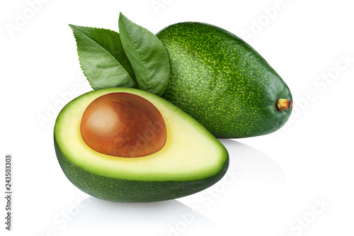 Ripe avocado with leaves, isolated on white background